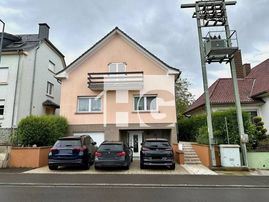 Продажа Отдельный дом на одну семью : 32, Rue de la Gare Käerjeng.  Парковочное место, с террасой, iD. 1453787